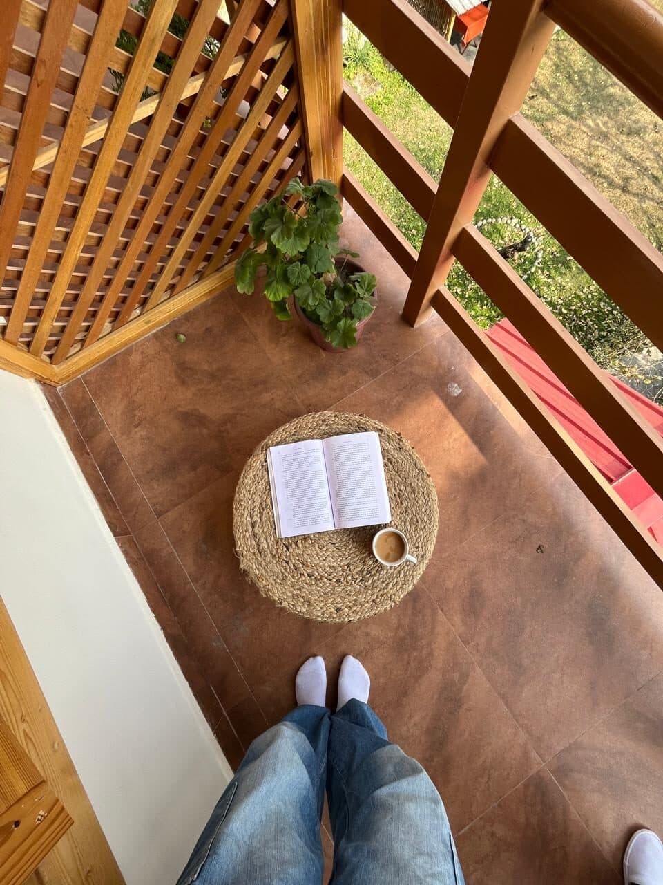 A slow morning on the balcony with a book