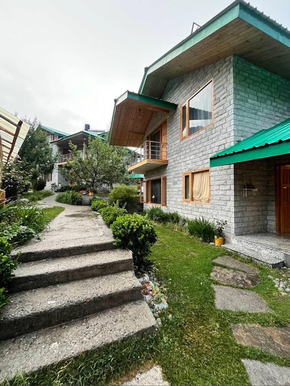 Stone steps through the Shanag garden to a chalet